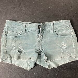 Green corduroy shorts